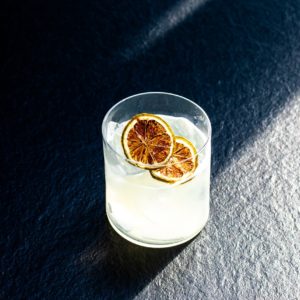 clear drinking glass with white liquid